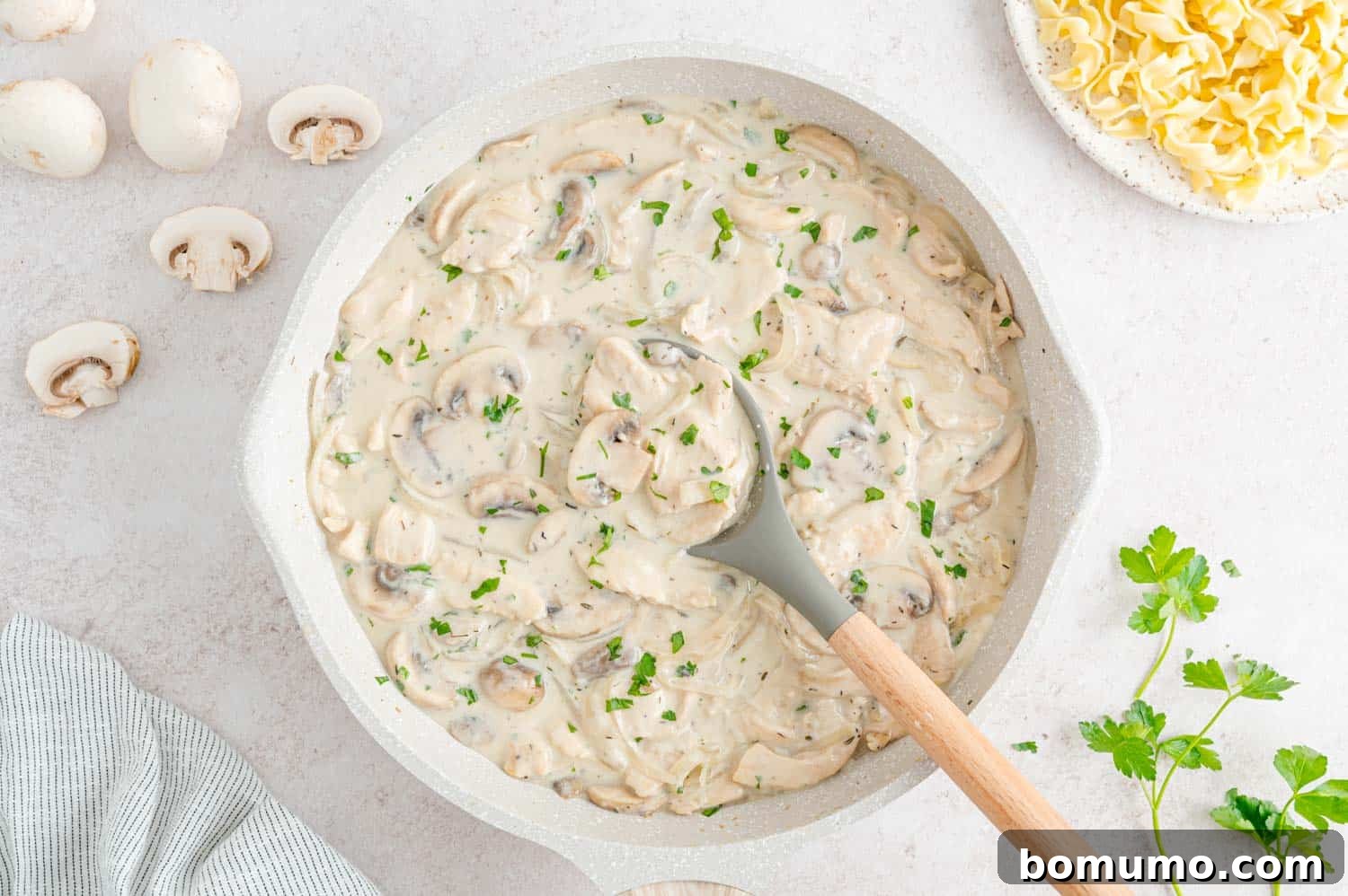 Velvety Chicken Stroganoff 12 Finished chicken stroganoff in the pan, creamy and ready to serve.