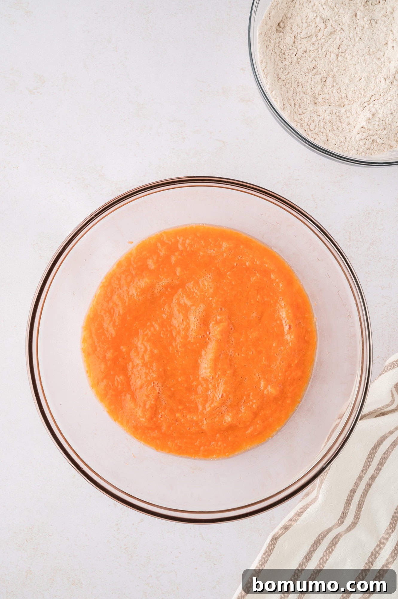 Wet ingredients, completely combined in a bowl, ready for the dry ingredients.