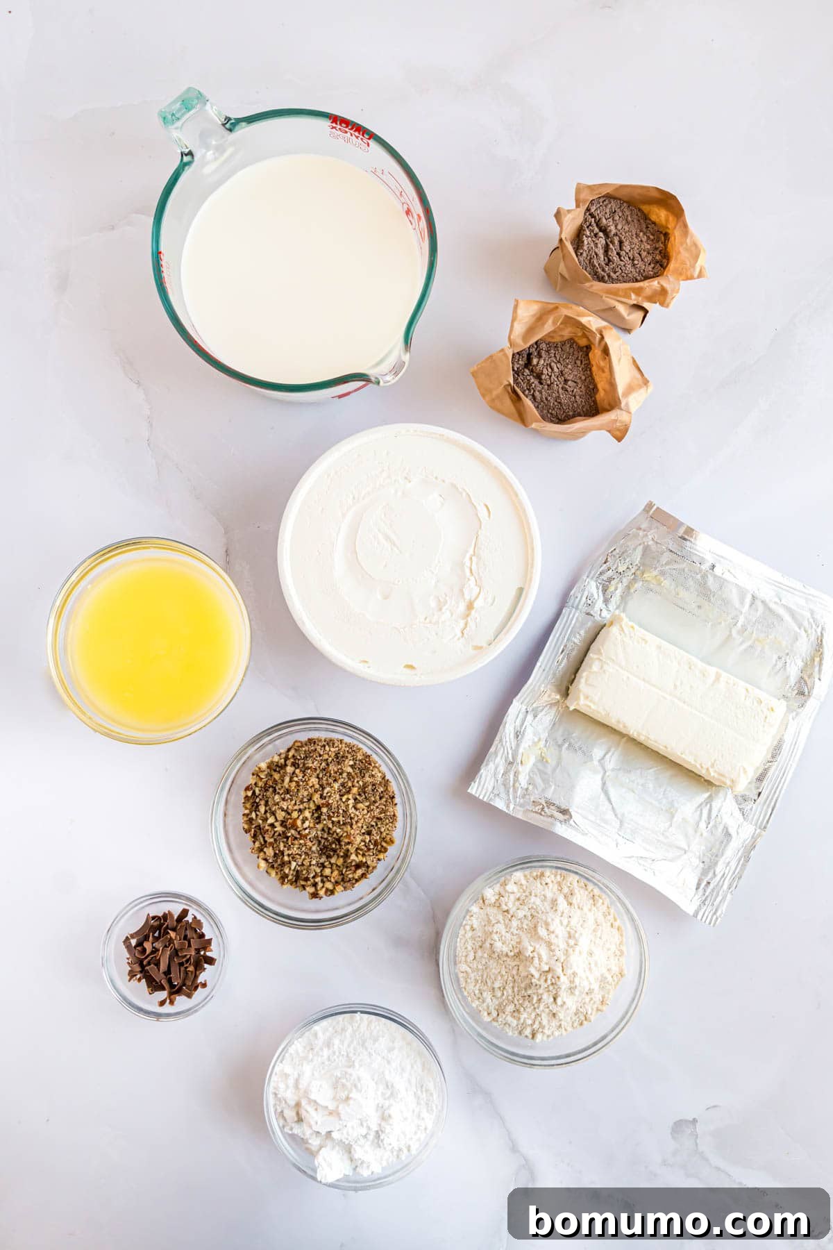 An overhead shot showcasing all the essential ingredients neatly arranged for the Chocolate Delight recipe, ready for preparation.