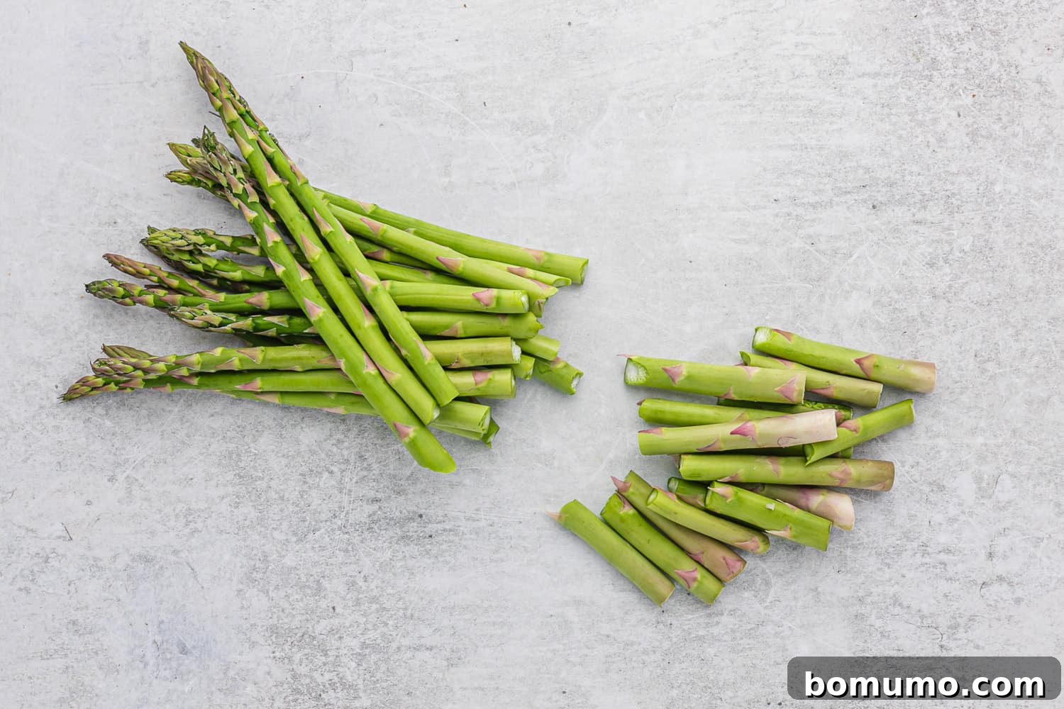 Creamy Asparagus Bake 5 Asparagus ends snapped off to show proper trimming technique.