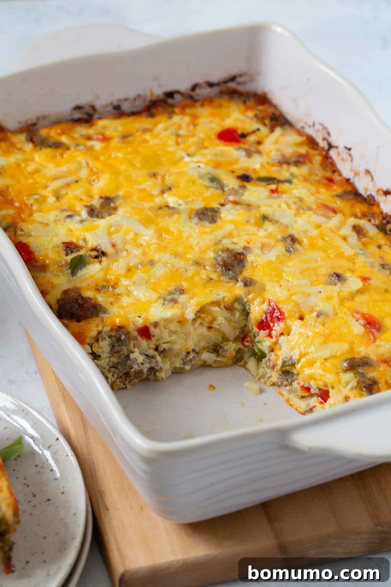 Egg casserole with a slice removed.