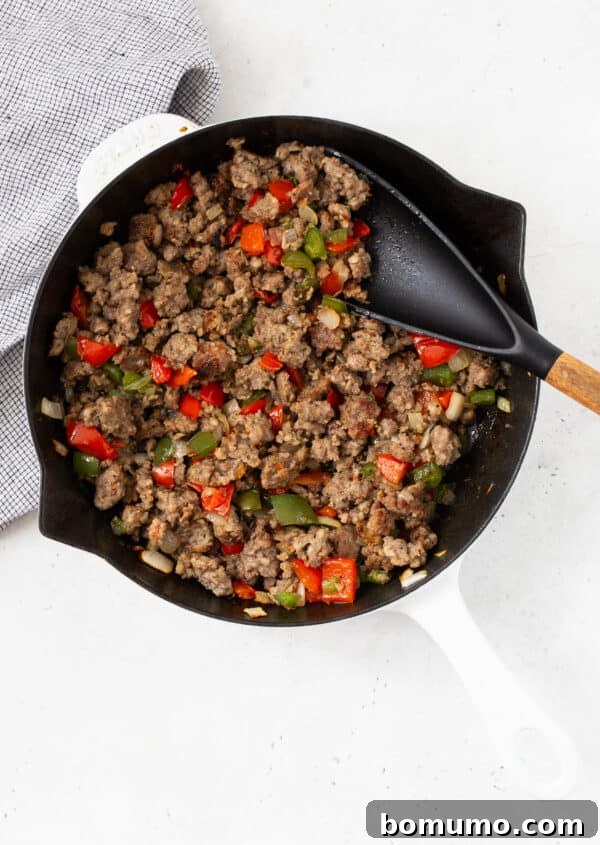 Sausage and vegetables after browning.