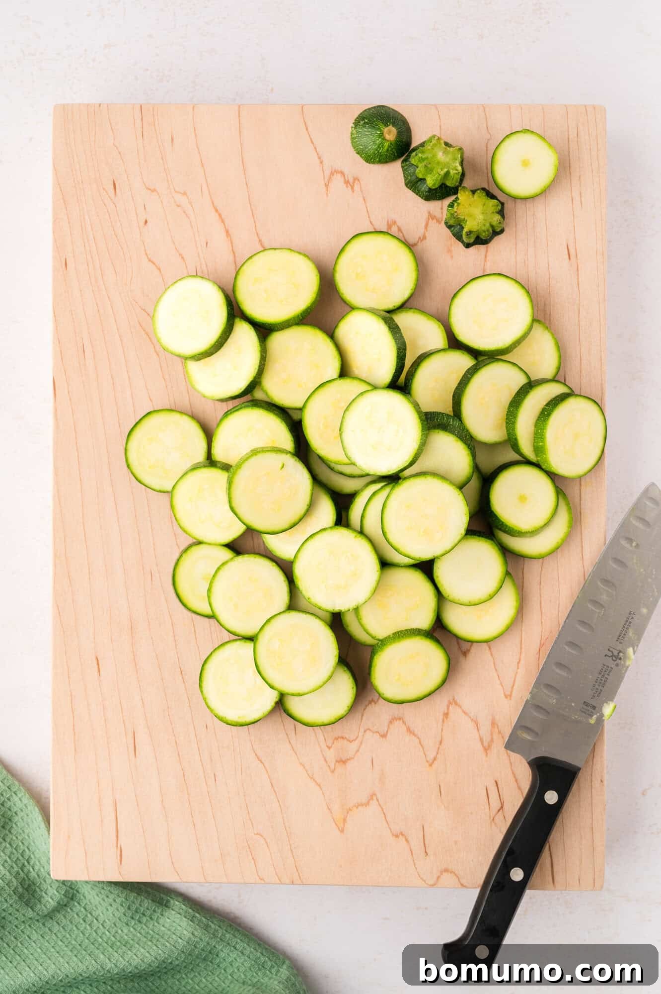 All zucchini completely sliced and prepared for sautéing.