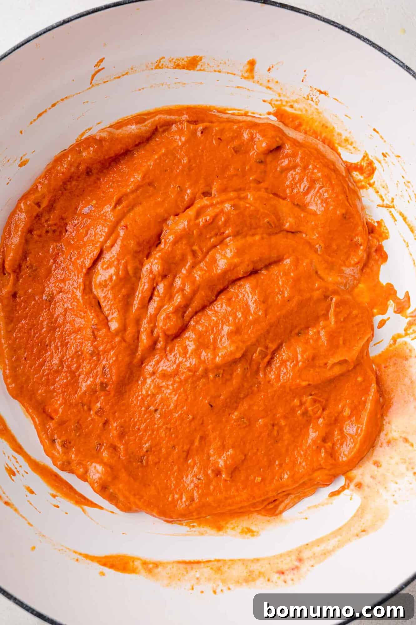 Cream added to sauce.