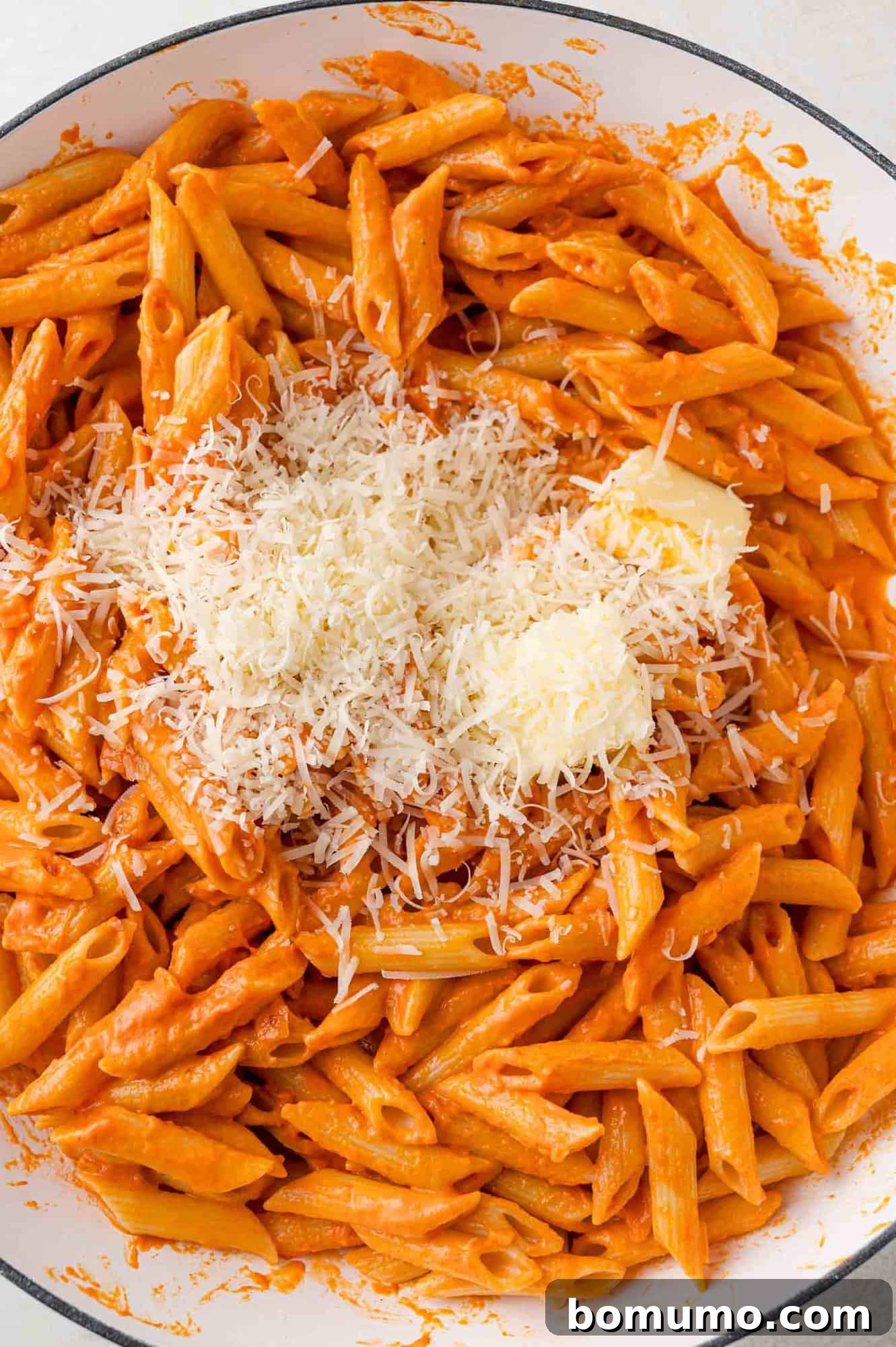 Butter and cheese added to sauce.