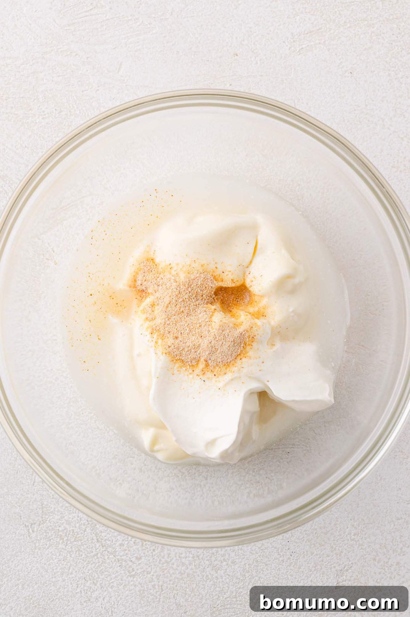 Individual dressing ingredients, ready to be combined.