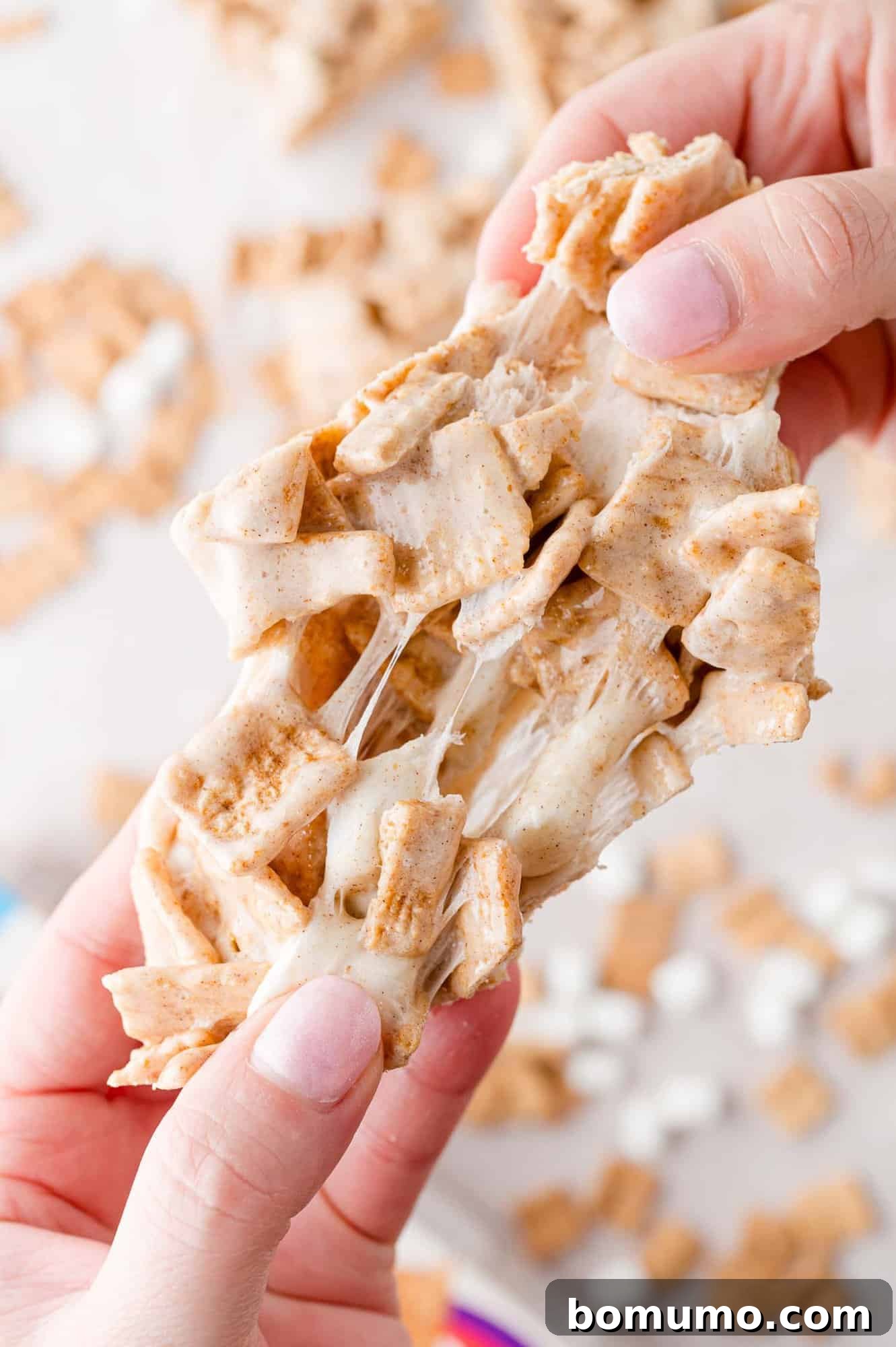 Cinnamon Crunch Bars 15 Cereal bar being pulled apart.