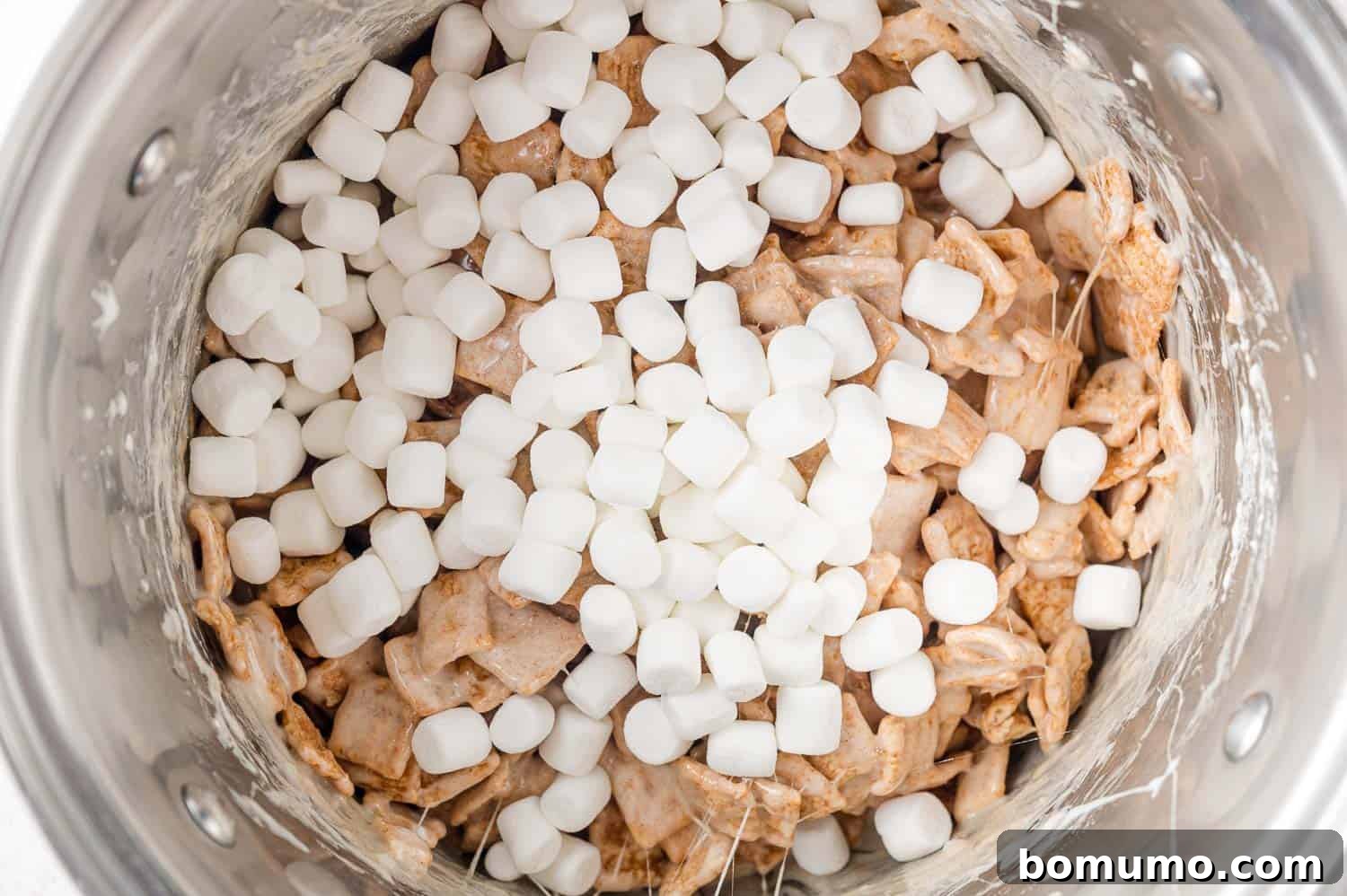 Cinnamon Crunch Bars 10 Mini marshmallows added to marshmallow and cereal mixture.