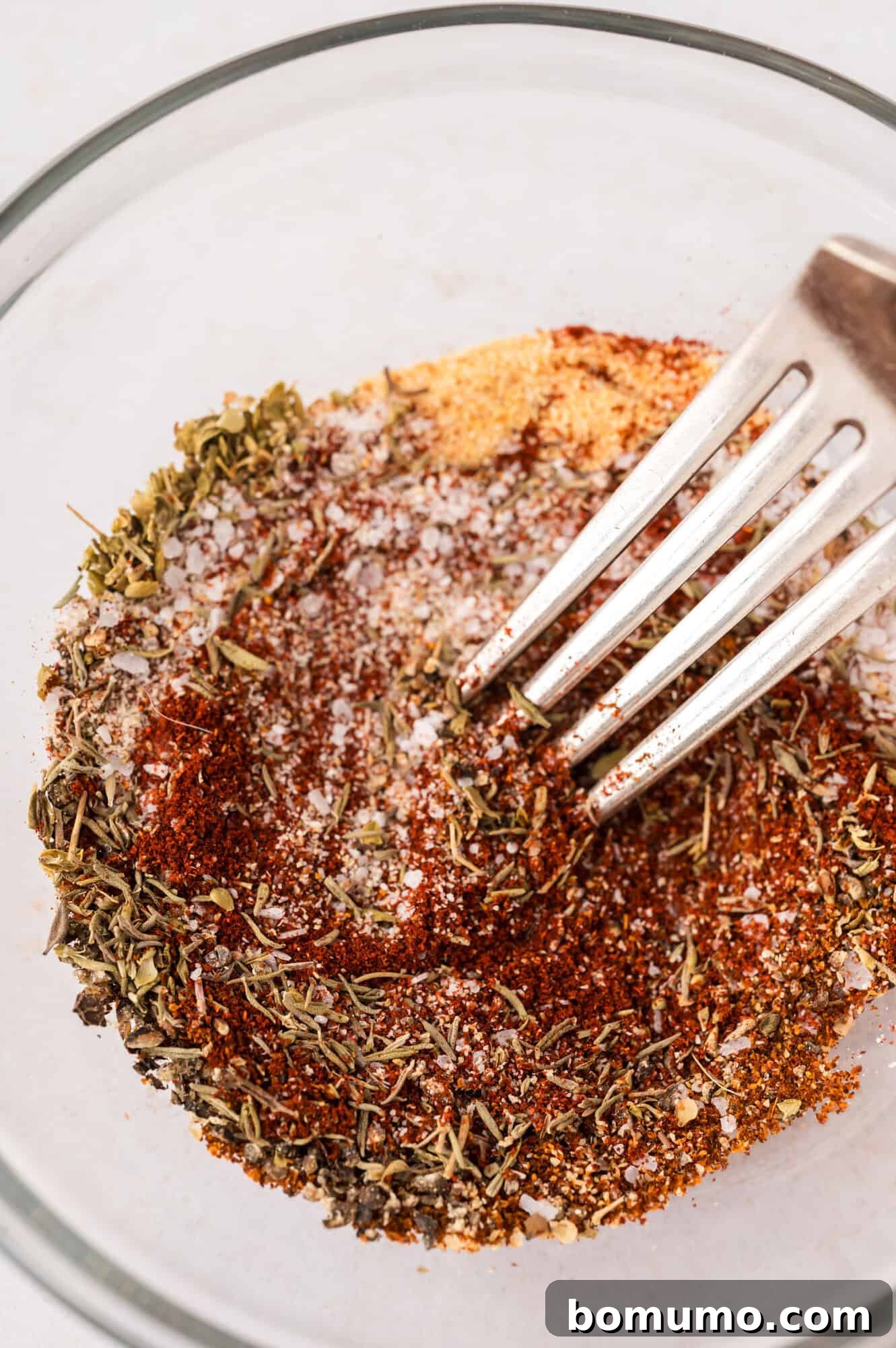 Spices mixed together in a bowl.