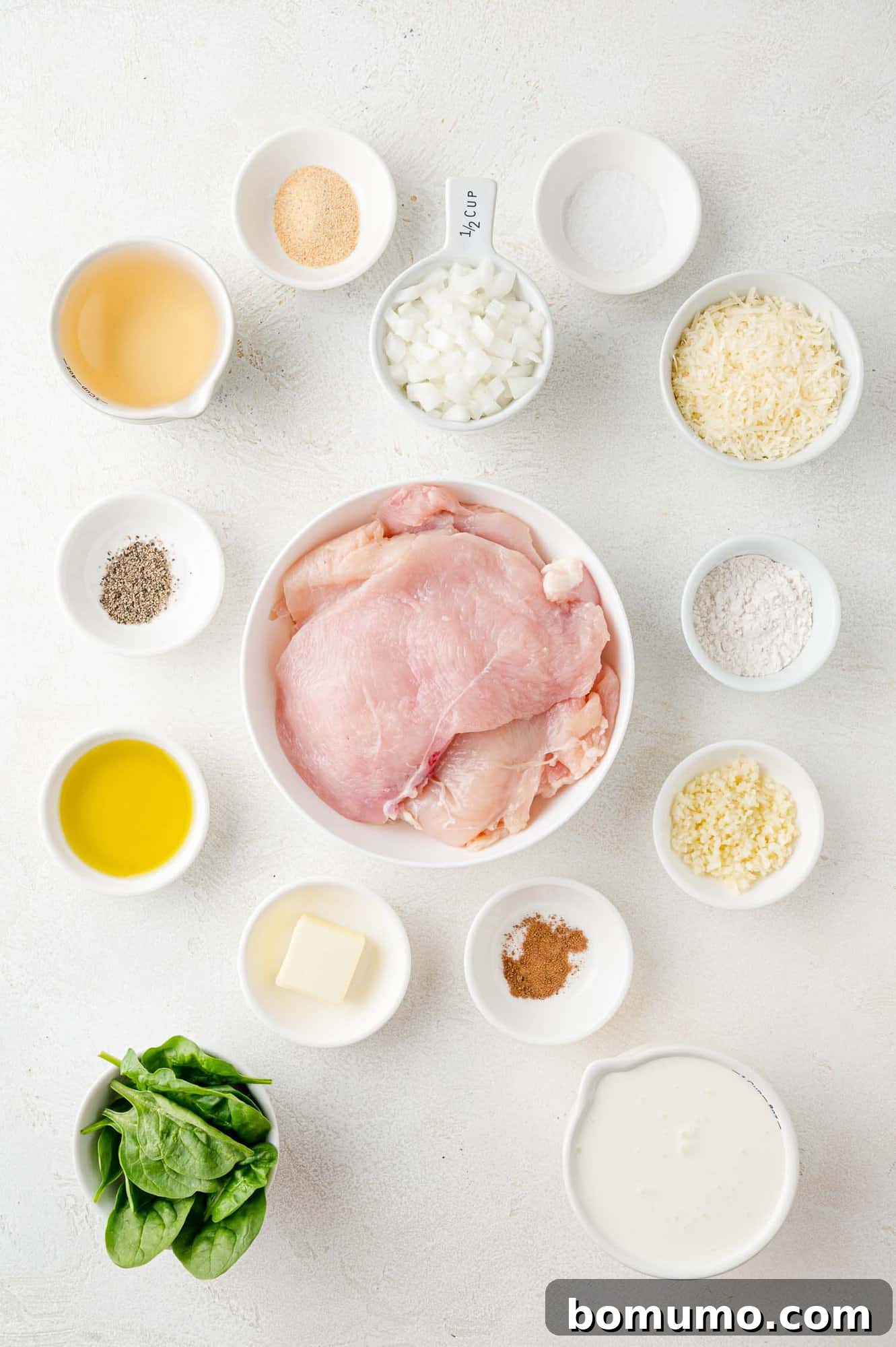 Silken Florentine Chicken 4 An overhead view showcasing all the fresh ingredients meticulously laid out, ready for making Chicken Florentine.