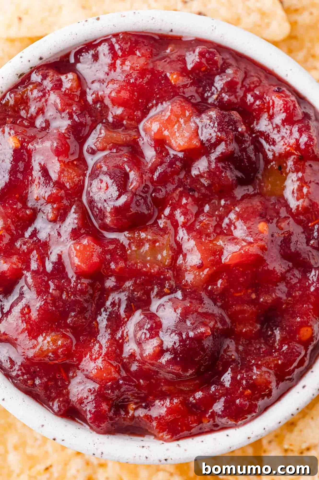 Simple Two Ingredient Cranberry Salsa 8 Cranberry sauce in a glass bowl.
