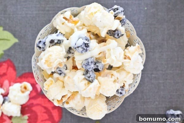 Blueberry Cream Pop 3 Close up overhead shot of Blueberry and Cream Popcorn.