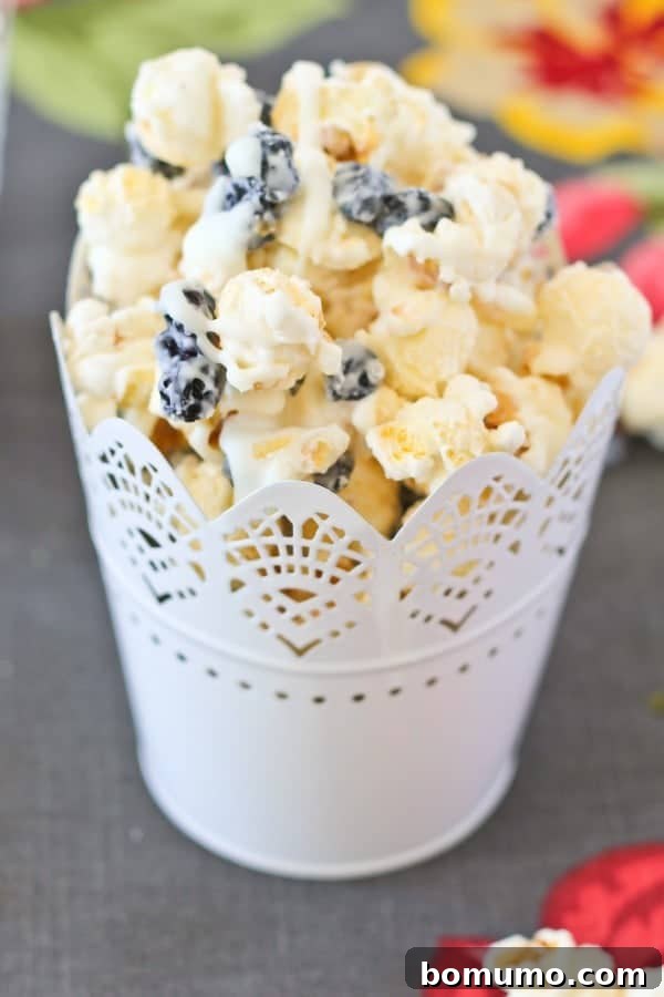 Blueberry Cream Pop 5 Closeup front view of popcorn in cup.