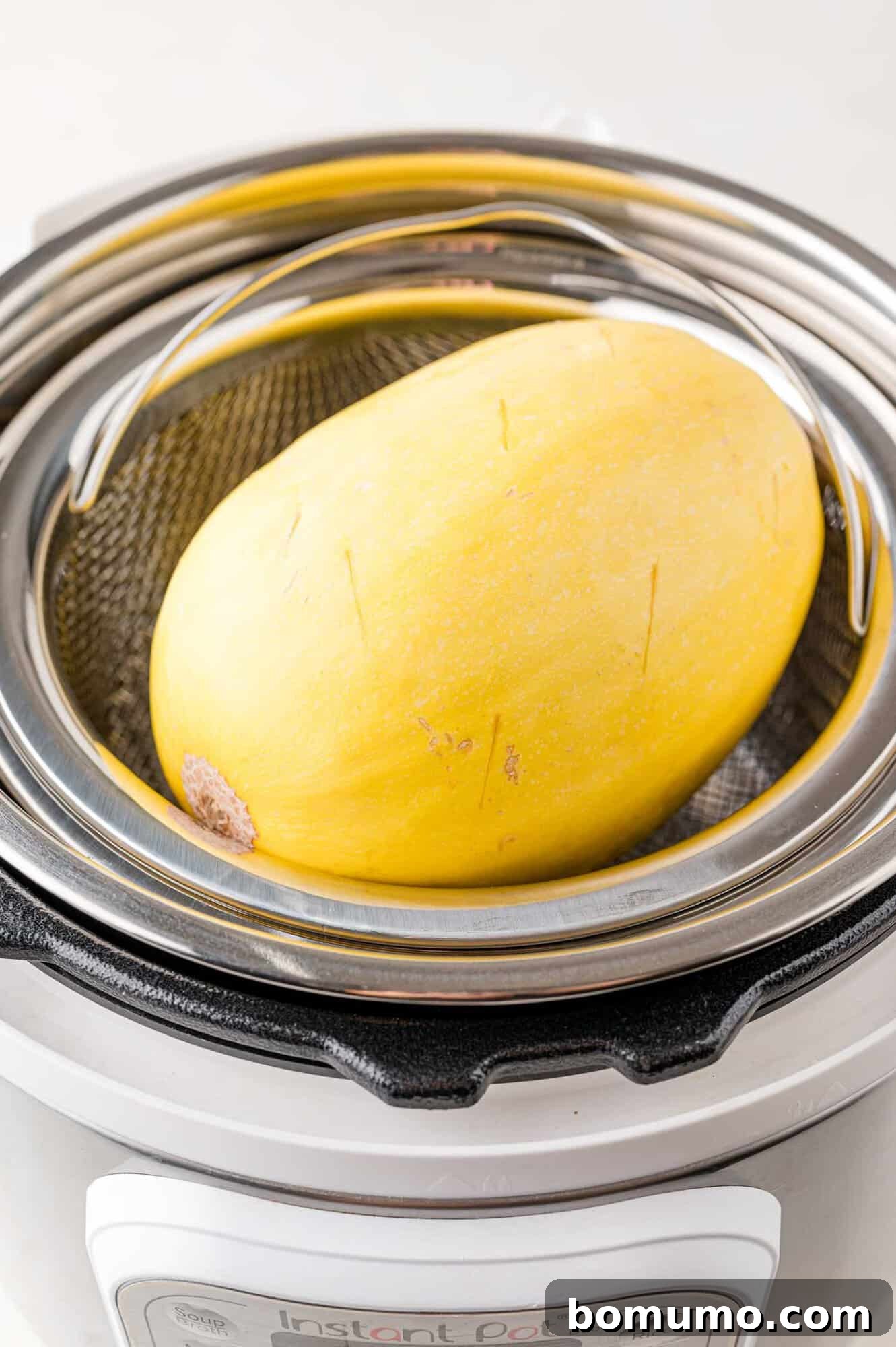 Easy Instant Pot Spaghetti Squash 7 Spaghetti squash placed in an Instant Pot.