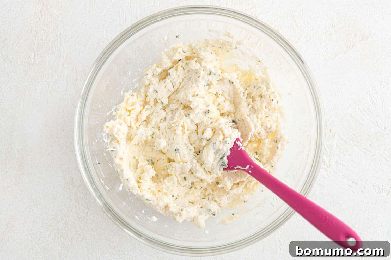 The blended cheese mixture, ready to be served as a creamy topping for the lasagna soup.