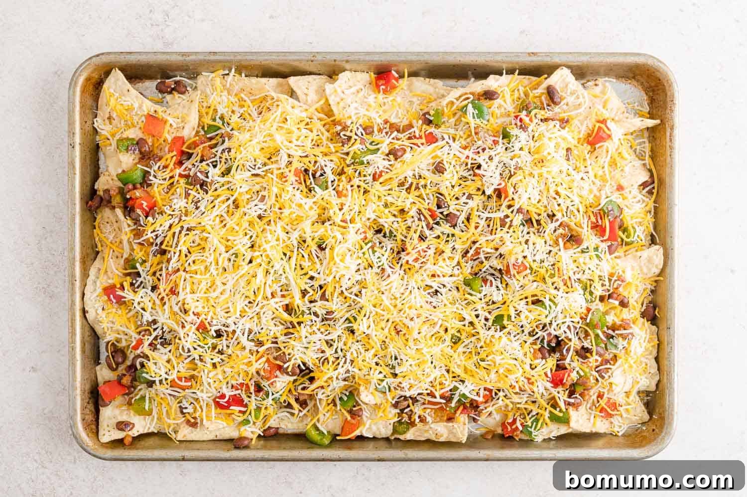 Nachos before baking.