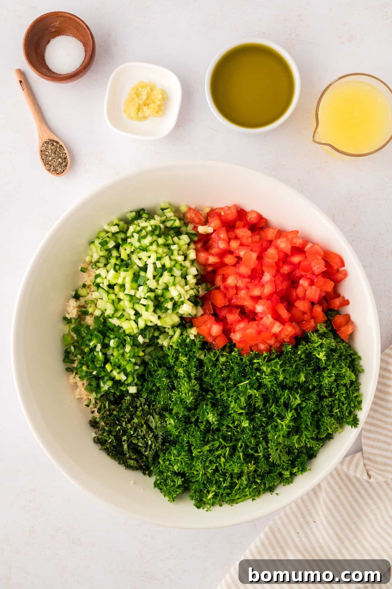 Tabbouleh salad ingredients, before being mixed together with the dressing.