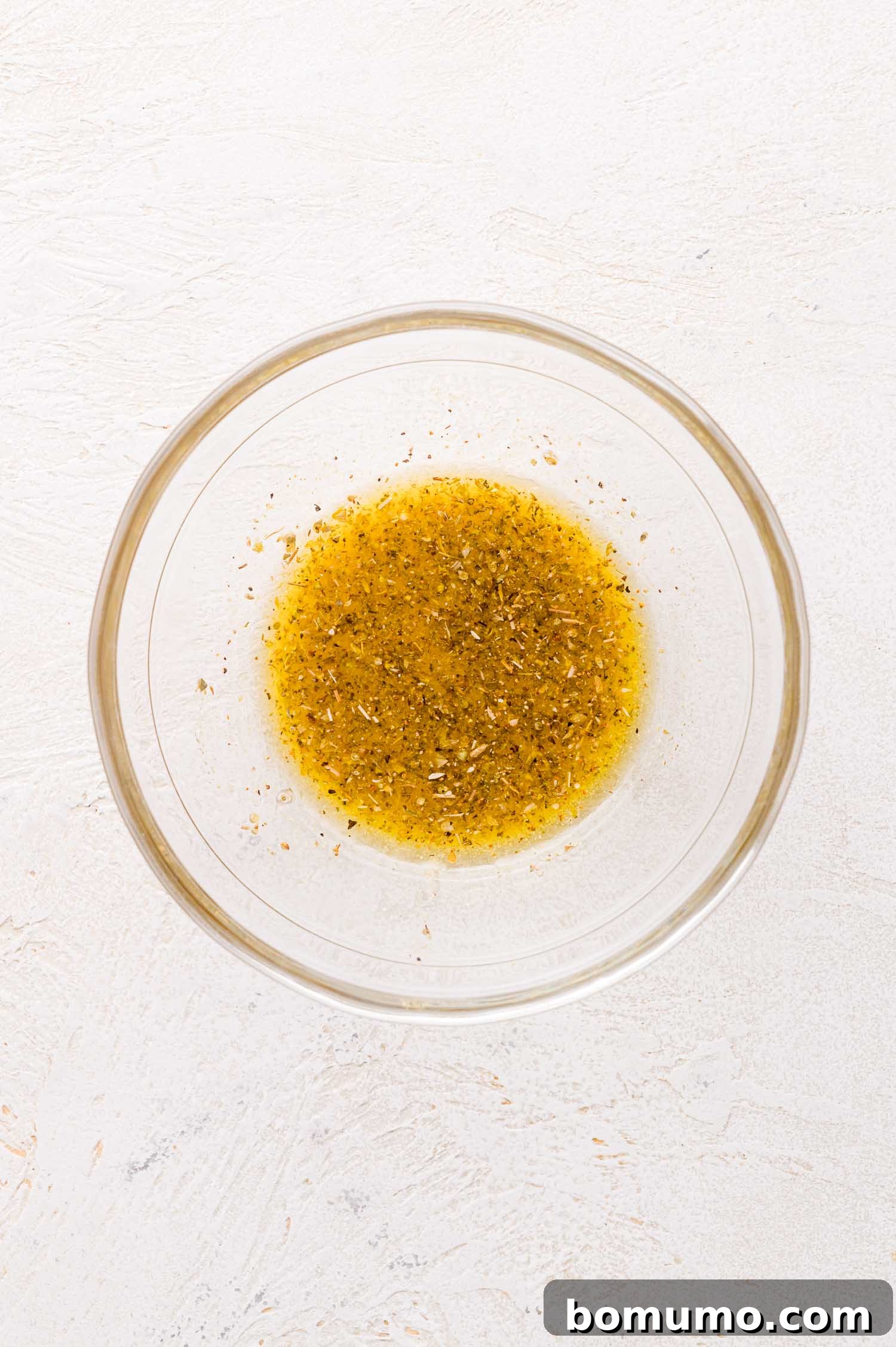 Oil with herbs.