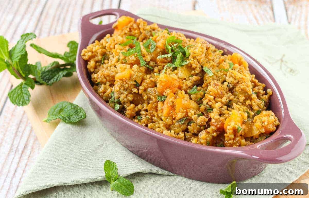 Turmeric seasoned freekeh with apricots.