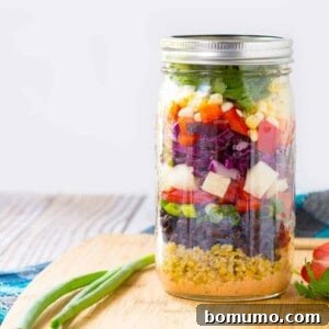 A beautifully crafted Southwestern Chopped Salad in a mason jar, perfect for a fresh and healthy meal.