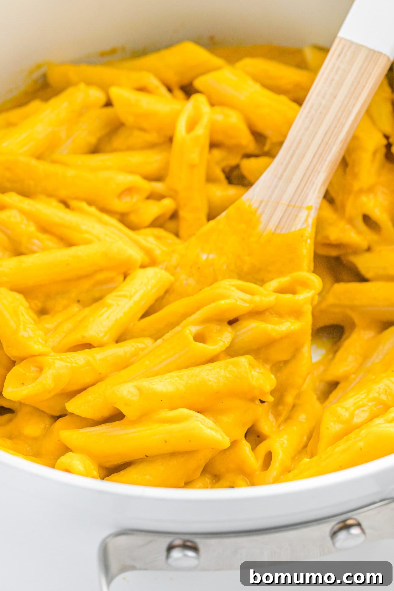 Carrot Sauce Symphony 3 Creamy carrot pasta in pan.