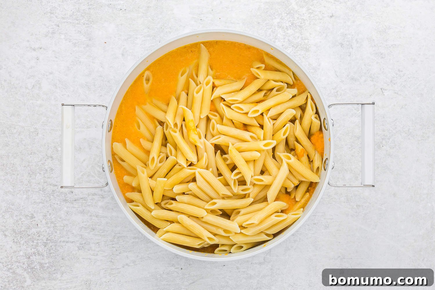 Carrot Sauce Symphony 10 Pasta not yet mixed with sauce.