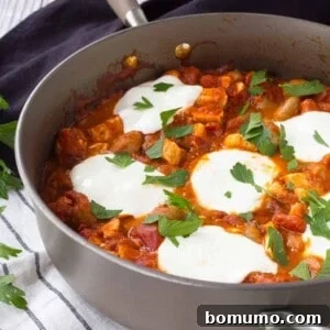 An easy weeknight meal that they whole family will love! This Skillet Gnocchi with Chicken and Tomato Sauce will be a new favorite one-pan meal! Get the easy recipe on RachelCooks.com!