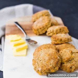 Whole wheat biscuits are flaky and decadent, like you'd expect. What's unexpectedly delicious is the crunch of cornmeal and flavor of cheddar and pepper. Get the easy recipe on RachelCooks.com!