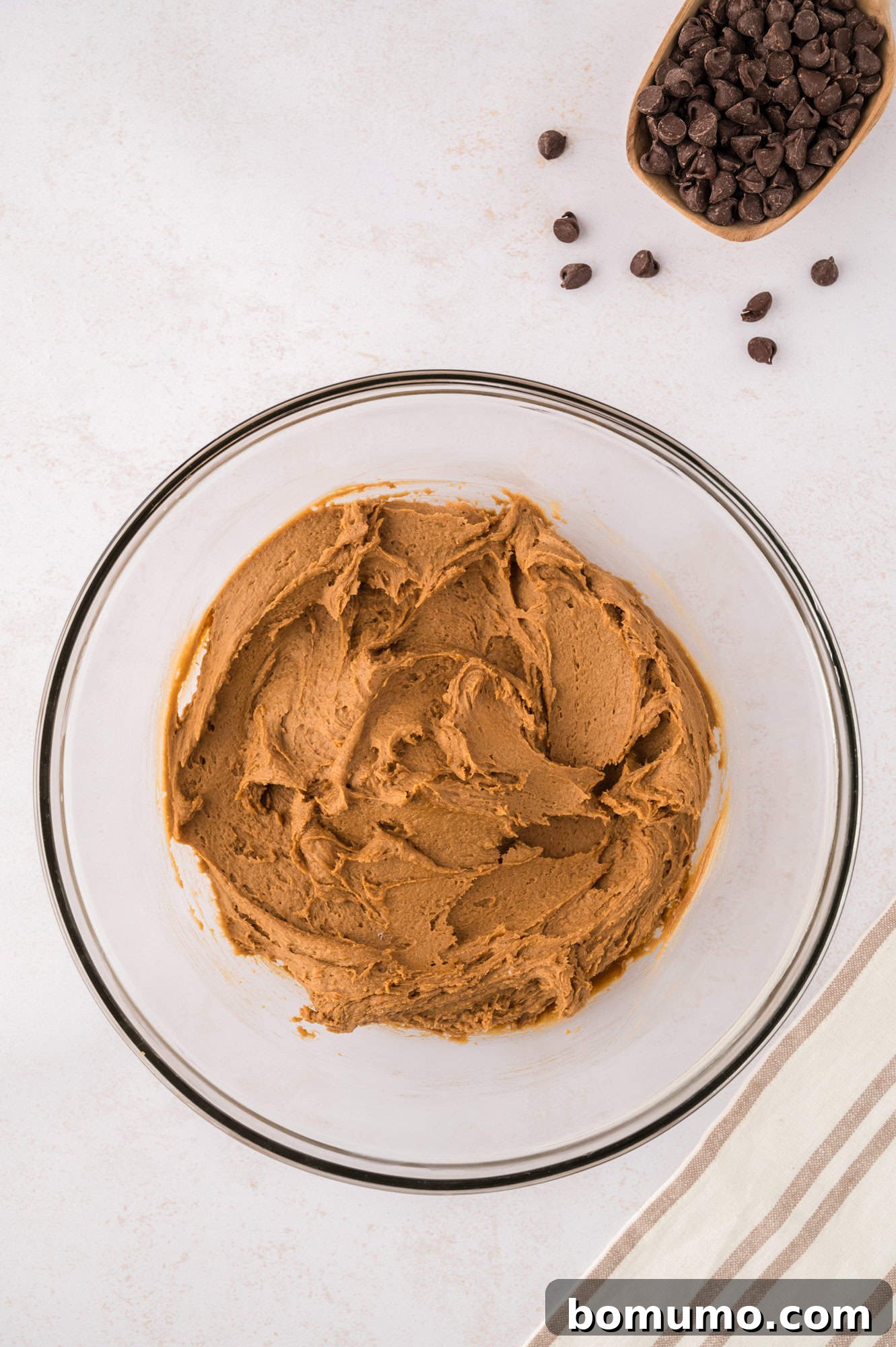 The fully mixed cookie dough, smooth and ready, just before the addition of chocolate chips.