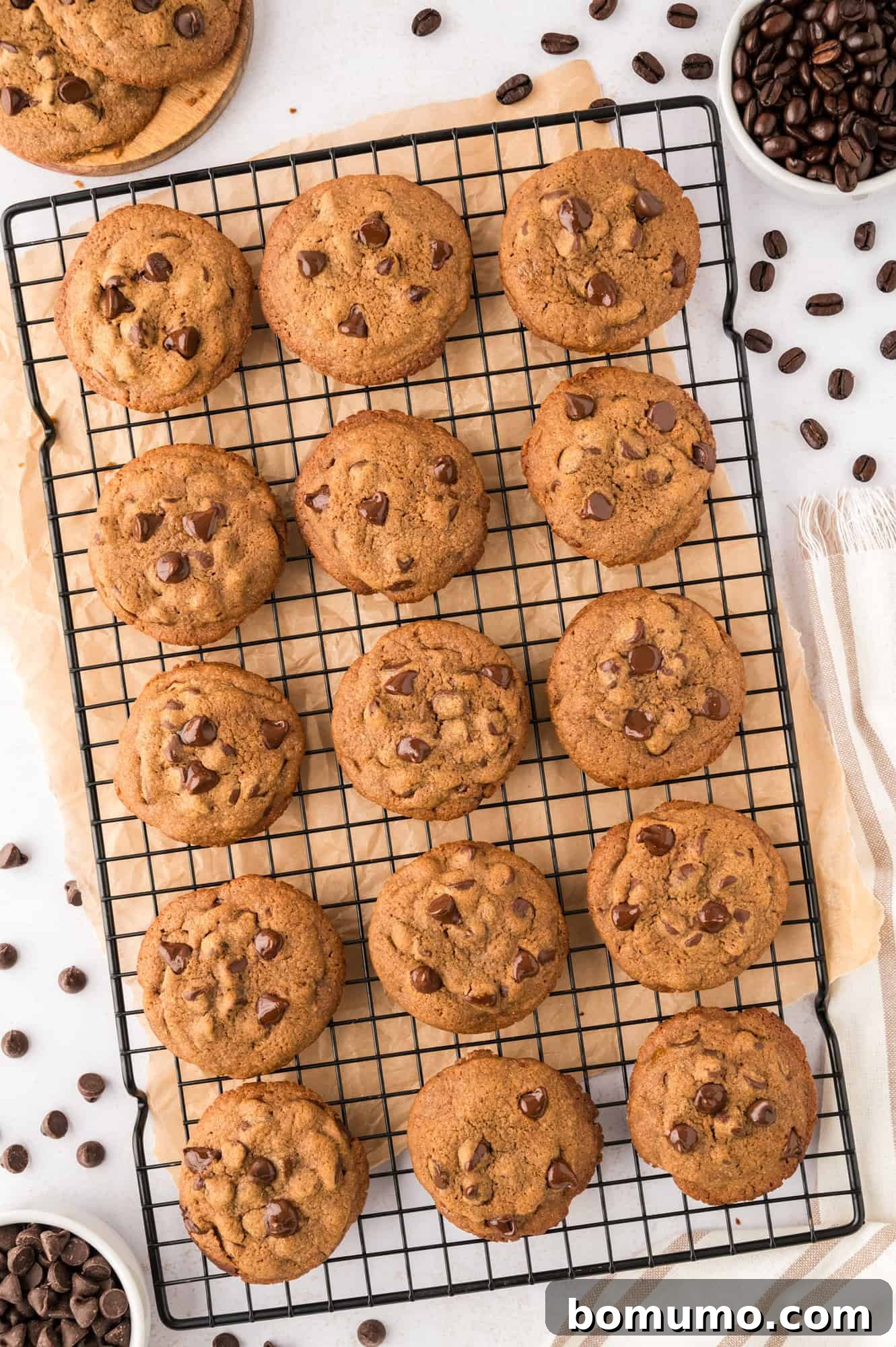Baked coffee cookies cooling gracefully on a wire rack, allowing air circulation for even cooling.