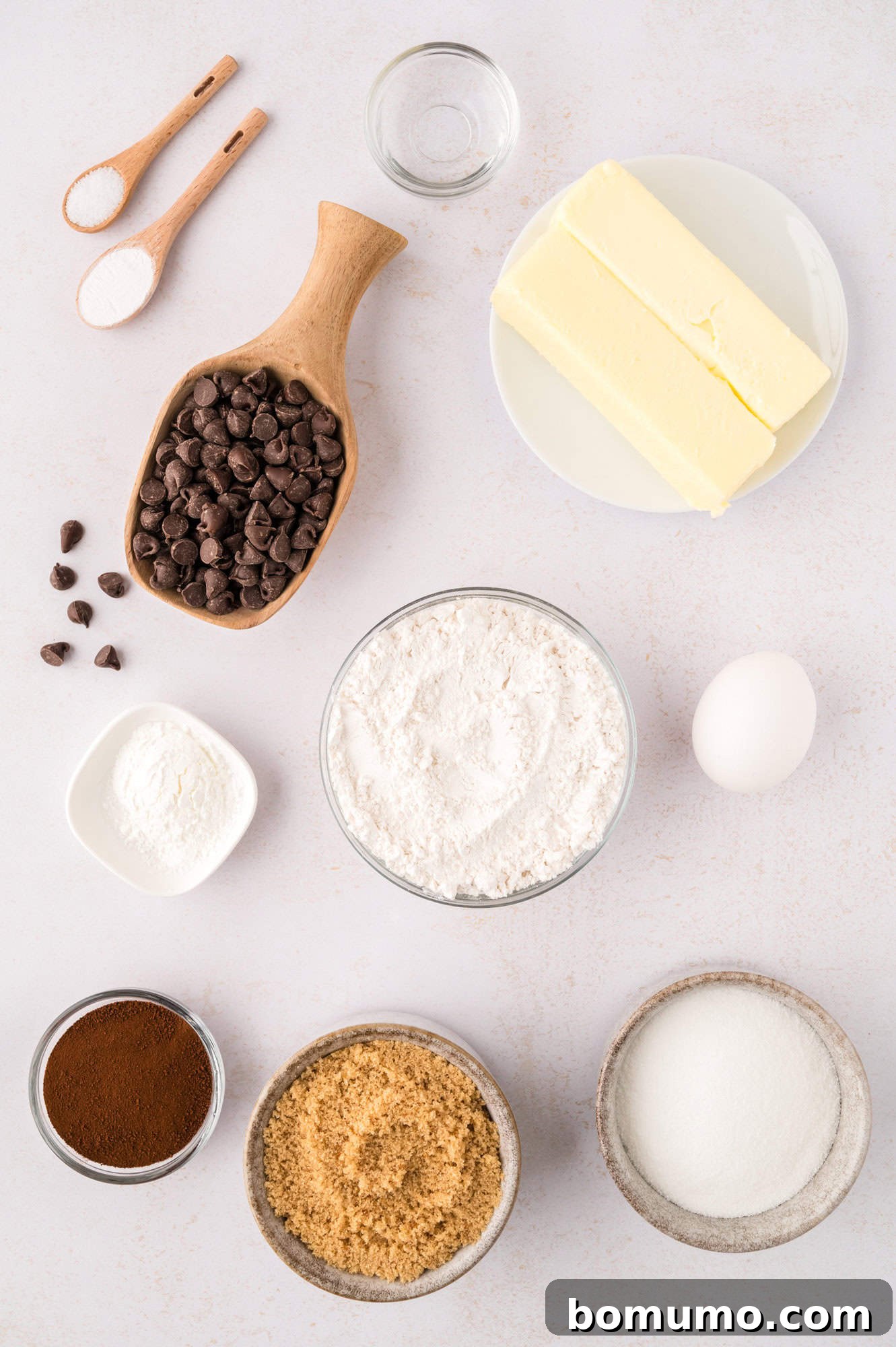An overhead view showcasing all the essential ingredients meticulously laid out for the coffee cookie recipe, ready for preparation.