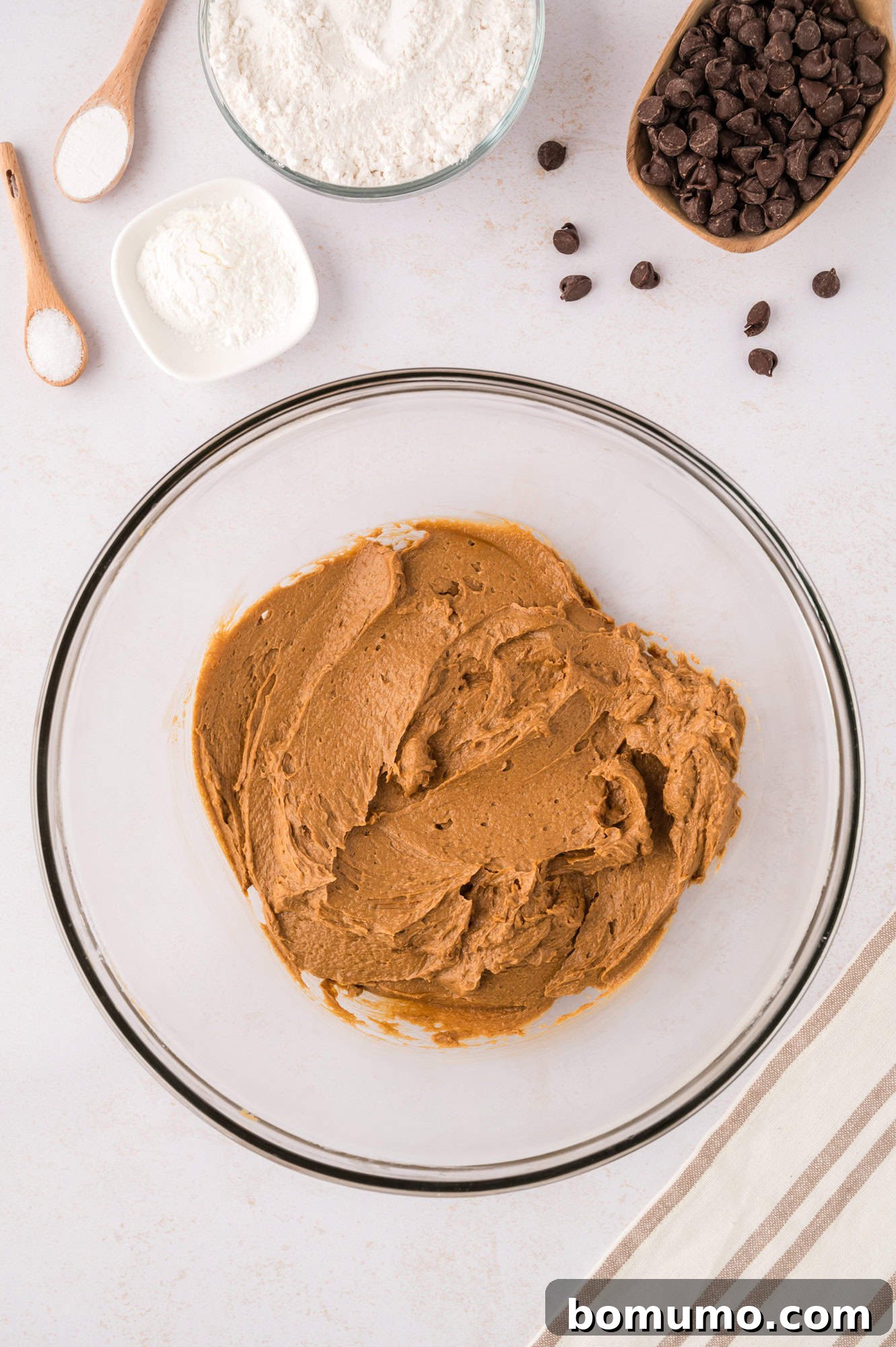 The espresso mixture fully blended into the cookie batter, showcasing a smooth, rich coffee-colored dough.