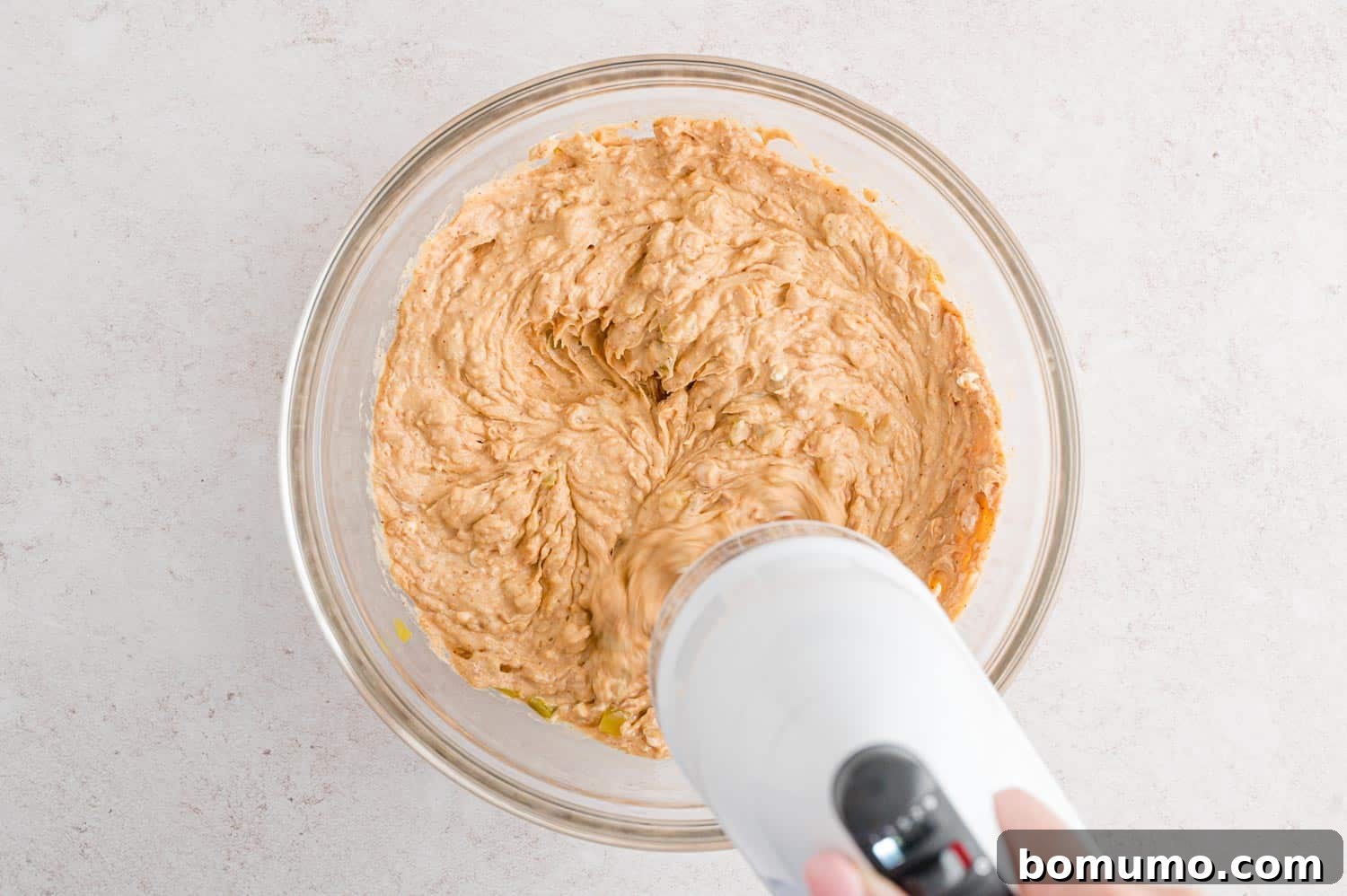 Smooth Bean Party Pleaser 7 All ingredients mixed together in a mixing bowl, creating a smooth bean dip base.