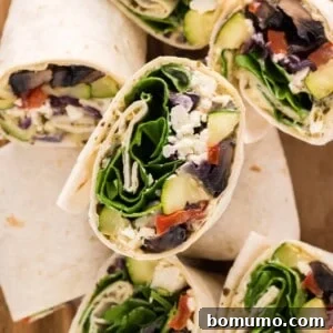 Multiple vegetable wraps, cut to show filling.