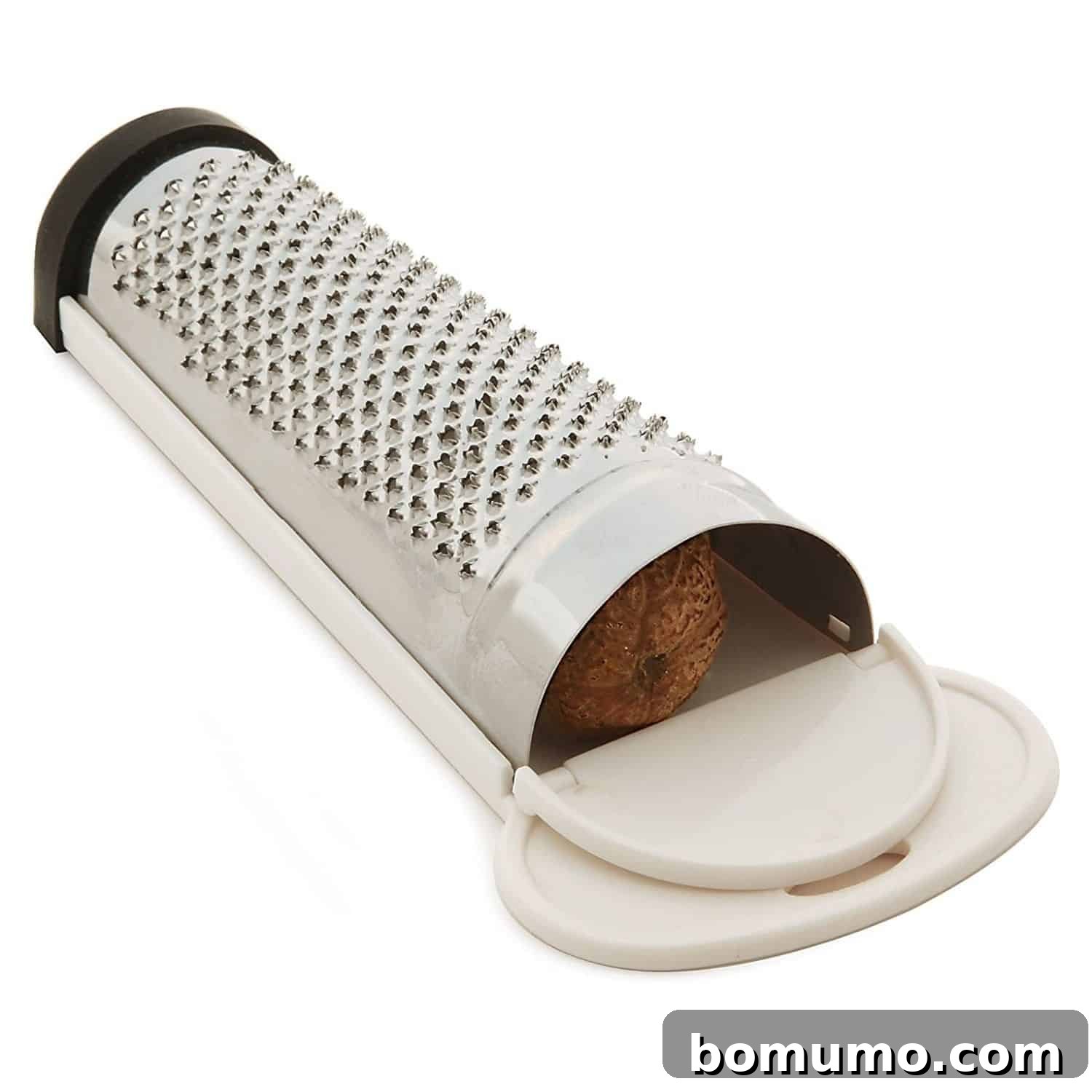 Close-up of a nutmeg zester, a specialized kitchen tool designed for finely grating whole nutmeg, set against a clean white background.