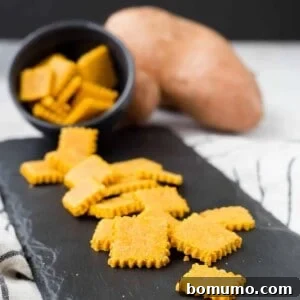 Sweet potato and rosemary gluten-free crackers, perfect for a healthy and easy homemade snack.