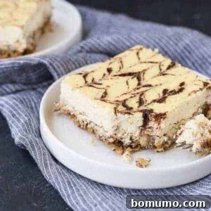 Delicious and healthy Breakfast Cheesecake with a cinnamon swirl, made with cottage cheese and Greek yogurt, perfect for breakfast or dessert.