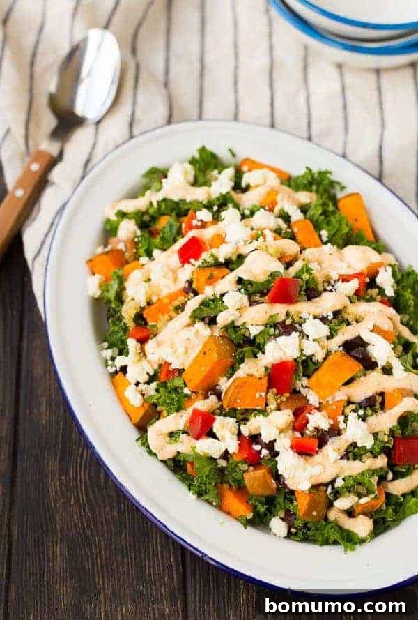 Close-up of fresh Kale Sweet Potato Salad with quinoa and black beans, showing its vibrant texture.