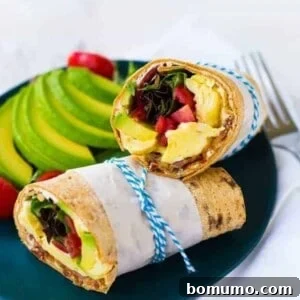 This California Breakfast Wrap is great for breakfast or lunch! The salty bacon, creamy avocado, fresh tomatoes and filling eggs make it a perfect meal! Get the easy recipe on RachelCooks.com!