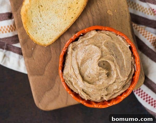 Homemade gingerbread butter in a charming bowl, ready to be served with holiday breakfast. Find this easy recipe on RachelCooks.com.