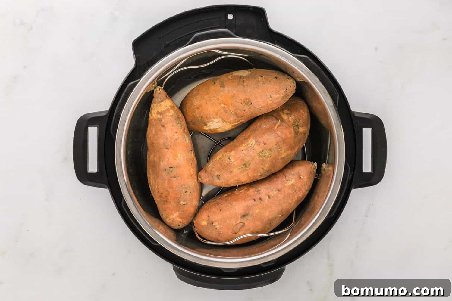 Foolproof Instant Pot Sweet Potatoes 6 Instant pot sweet potatoes before being cooked.