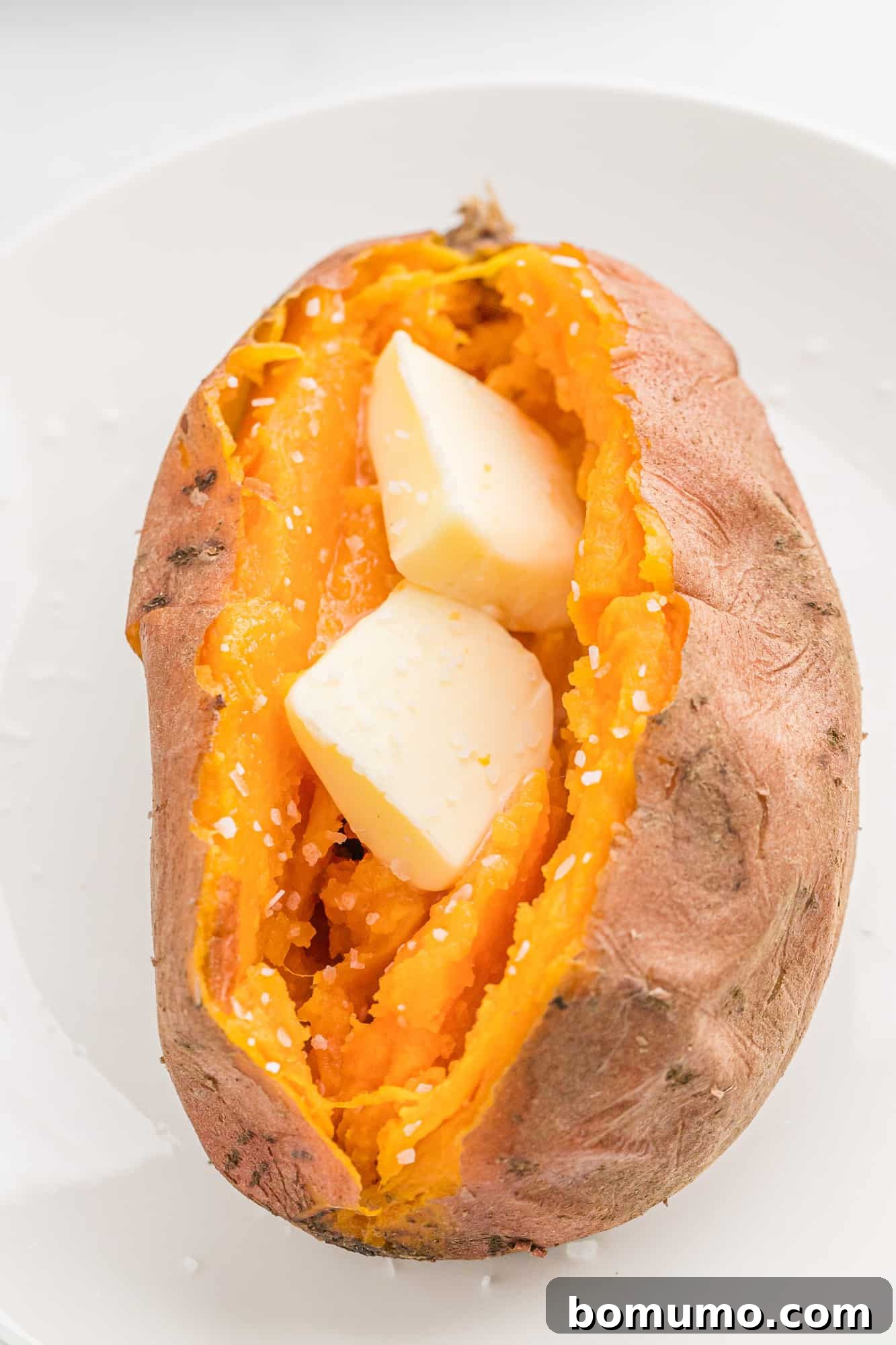 Foolproof Instant Pot Sweet Potatoes 9 Pressure cooker sweet potato with lots of butter.
