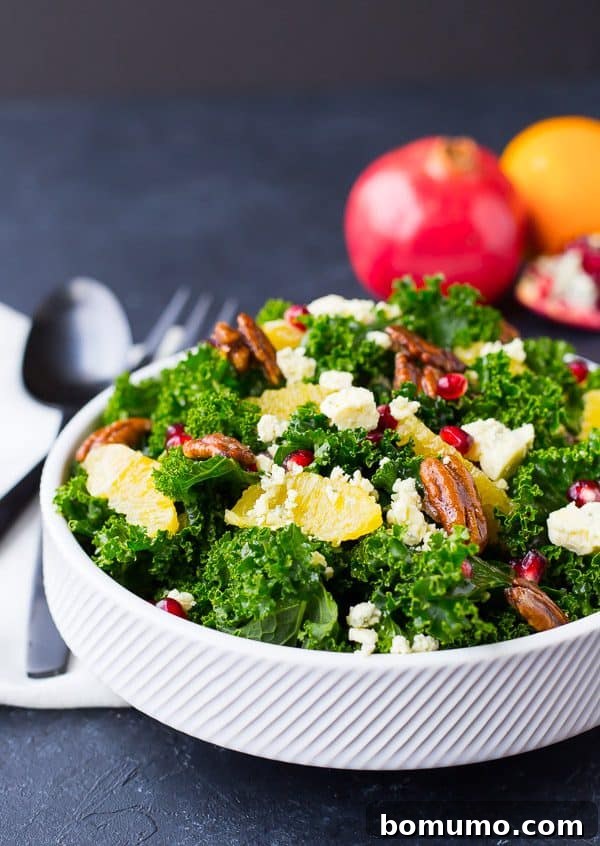 Close-up of a vibrant Christmas Kale Salad with colorful ingredients