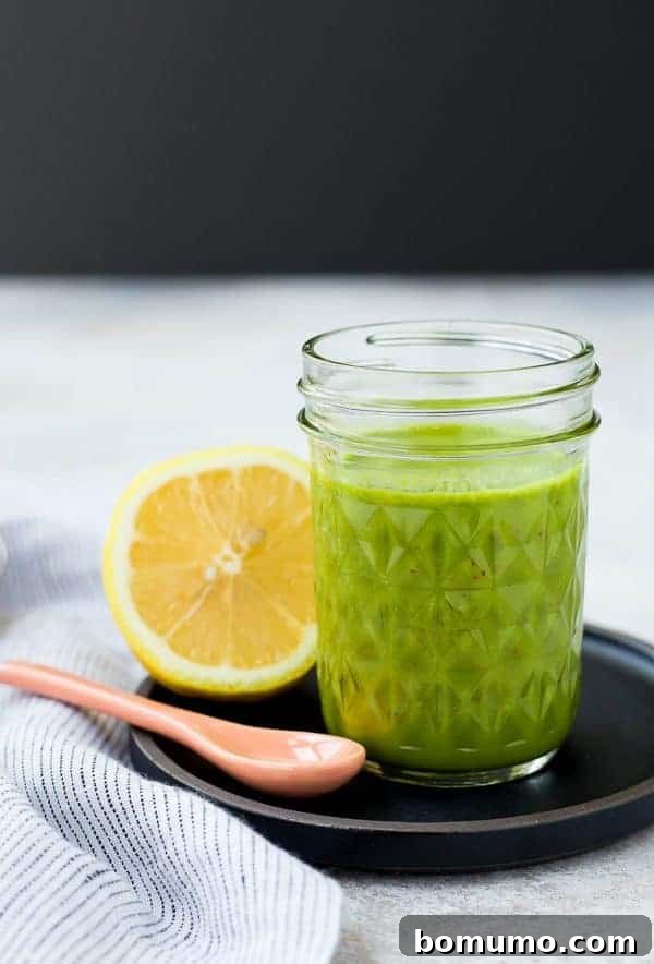Bright and fragrant, this lemon basil vinaigrette dressing is the perfect healthy salad dressing. It's Whole30 compliant and is a great addition to a green tossed salad or a pasta salad. It's also great drizzled on top of grilled chicken! Get the easy salad dressing recipe on RachelCooks.com!