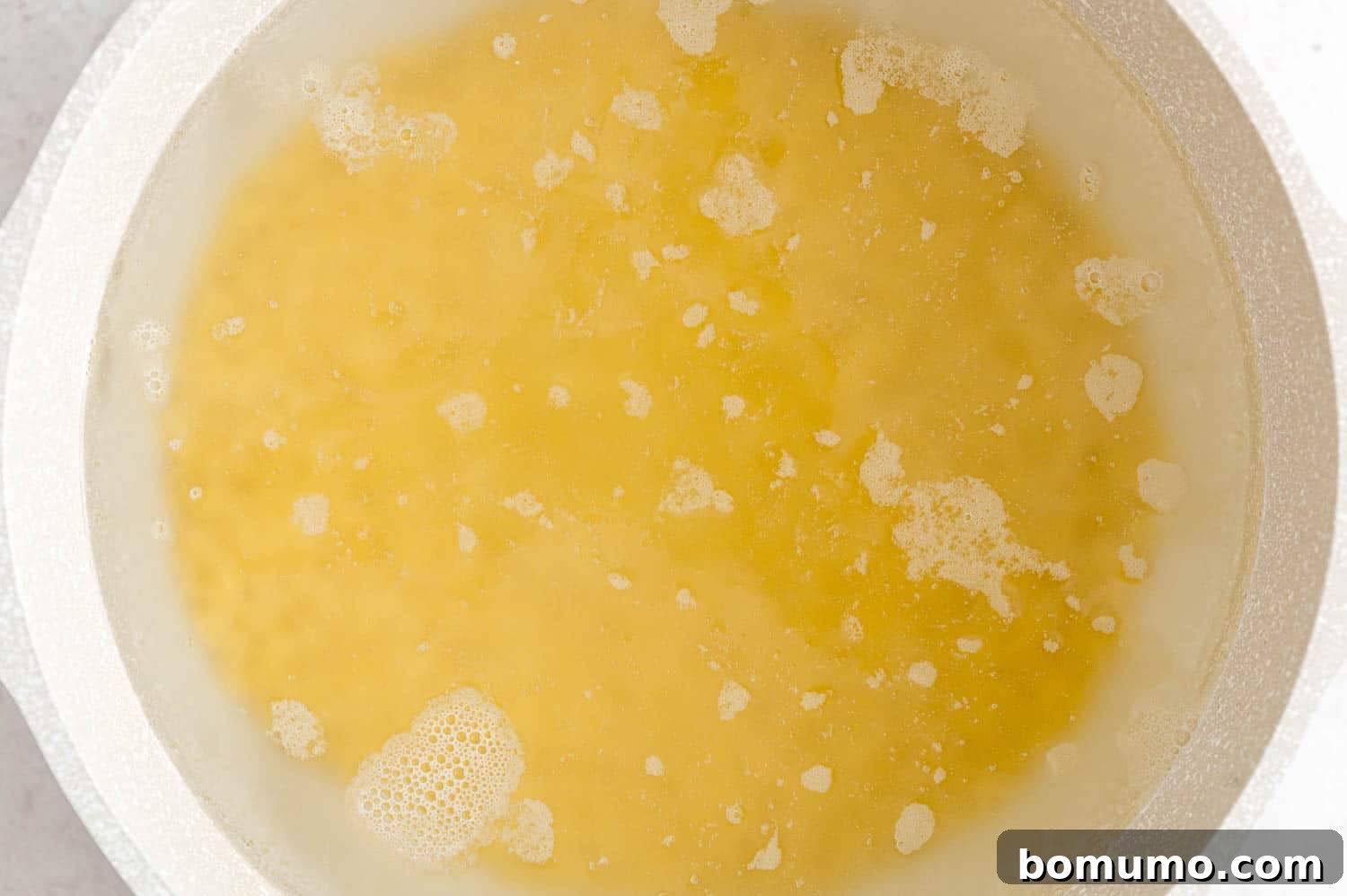 Orzo in boiling water.