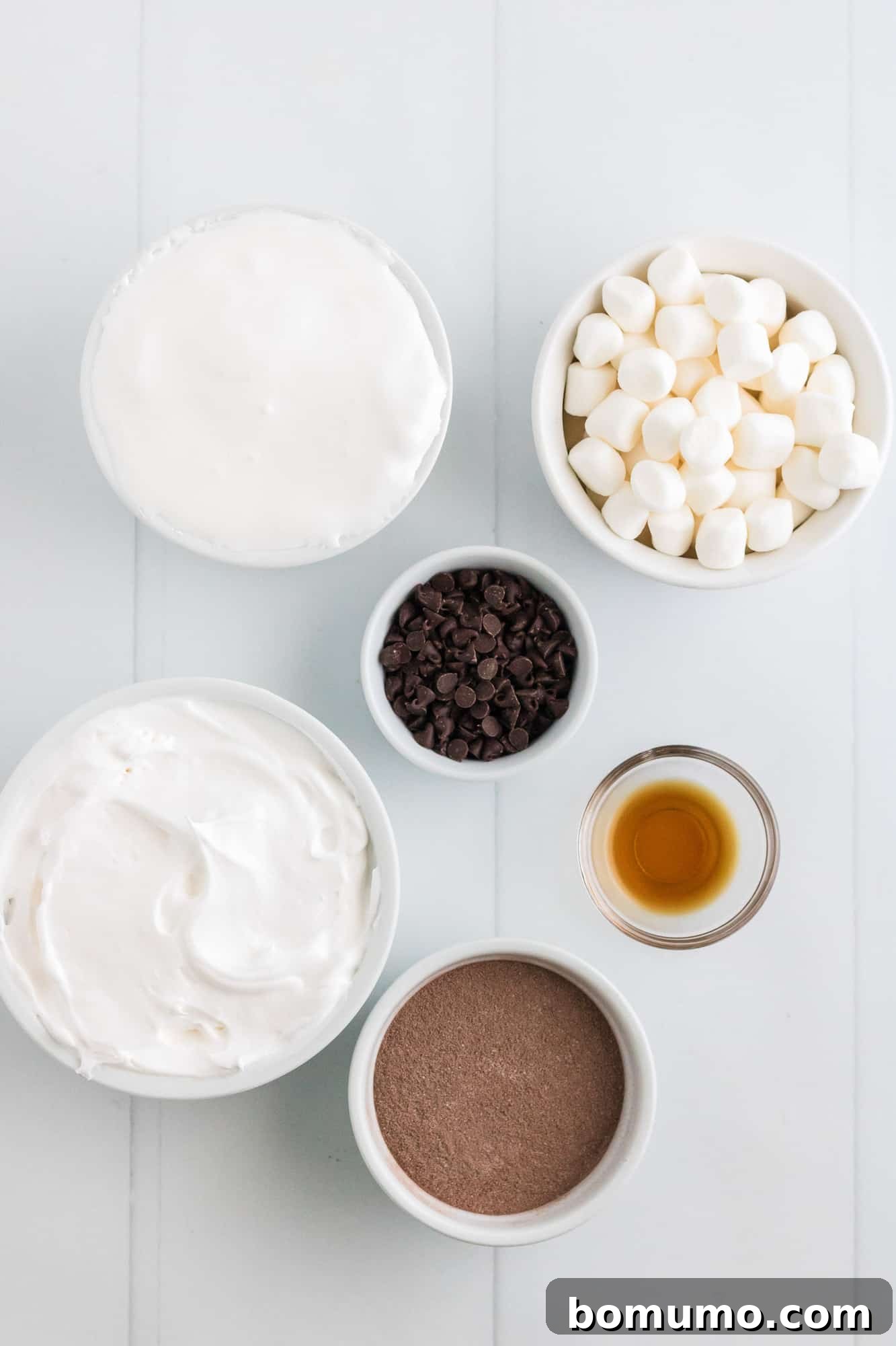 An overhead shot showcasing all the essential ingredients perfectly laid out, ready for making the hot chocolate dip.