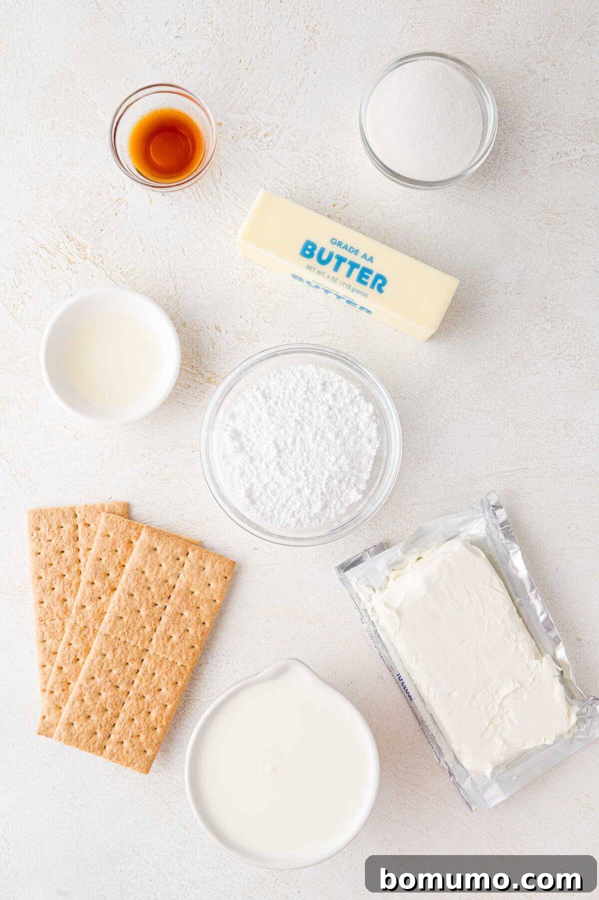 Effortless Mini Cheesecake Delights 4 Ingredients for a recipe arranged on a table: vanilla extract, sugar, butter, milk, powdered sugar, cream cheese, and graham crackers.
