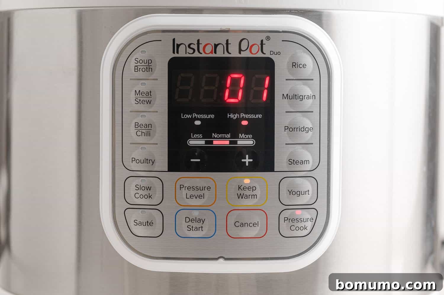 Effortless Instant Pot Quinoa 6 Instant Pot display showing a 1-minute cooking time setting.