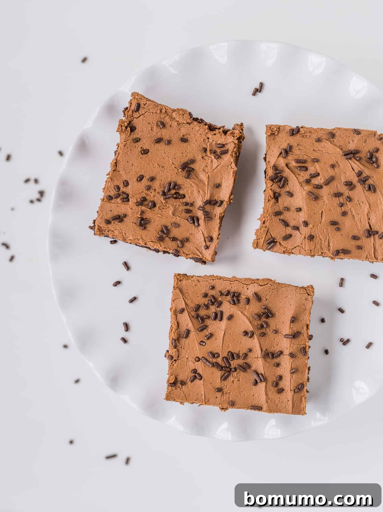 Effortless Mocha Brownies 3 Overhead view of frosted brownies with sprinkles.