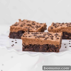 Effortless Mocha Brownies 6 Mocha brownies with frosting and sprinkles.